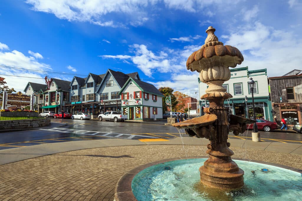 Scenic street view of Bar Harbor, Maine showcasing local shops and coastal charm